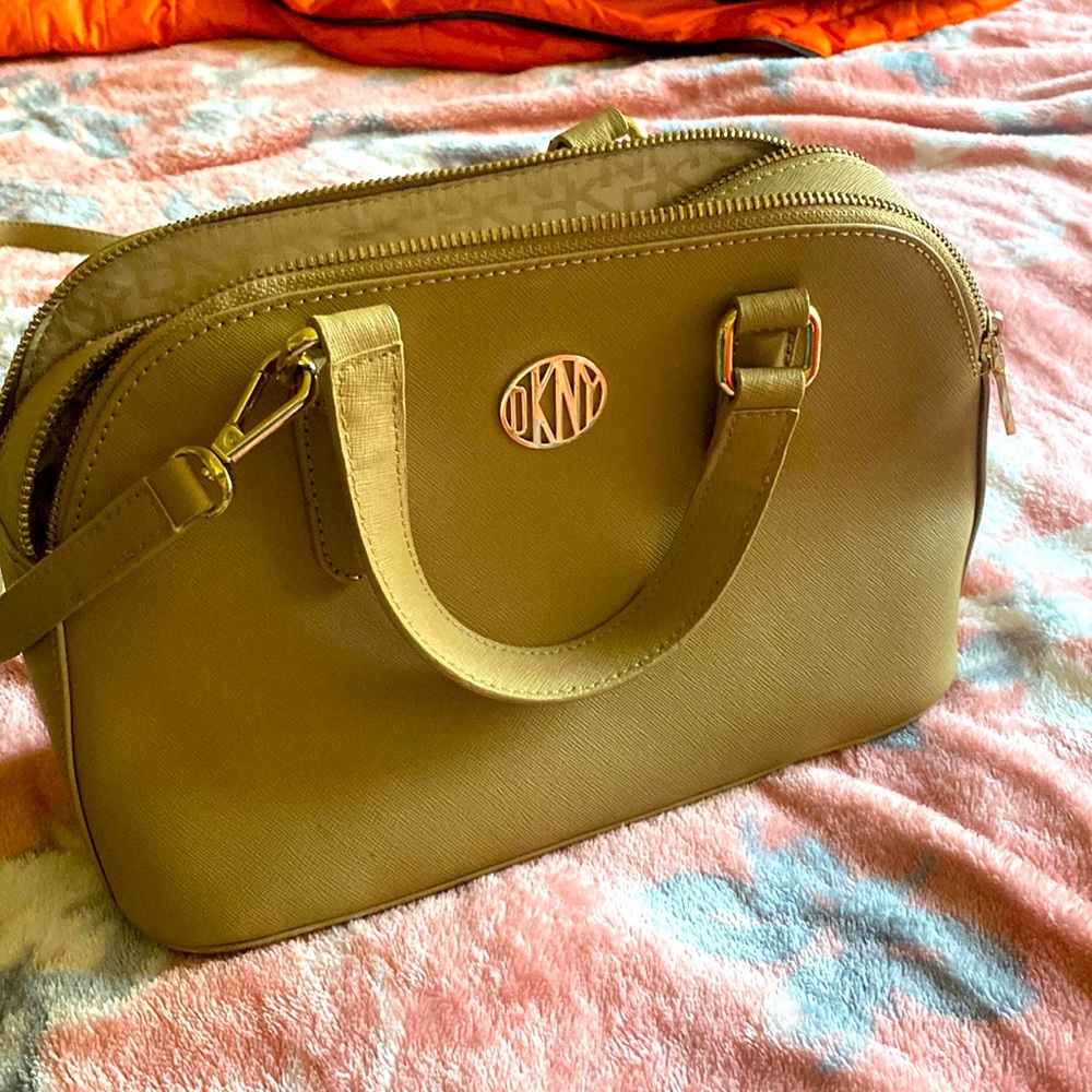 DKNY cross body bag, very handy and reliable.